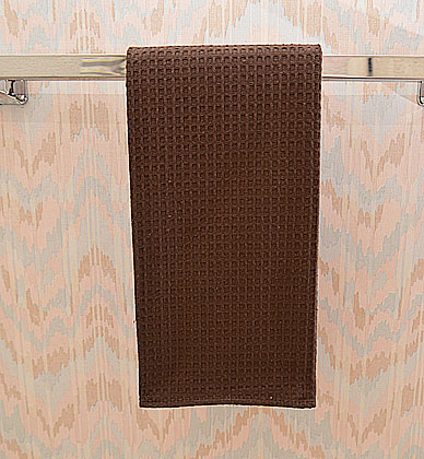 Festive colored waffle weaves kitchen towel. Brown color